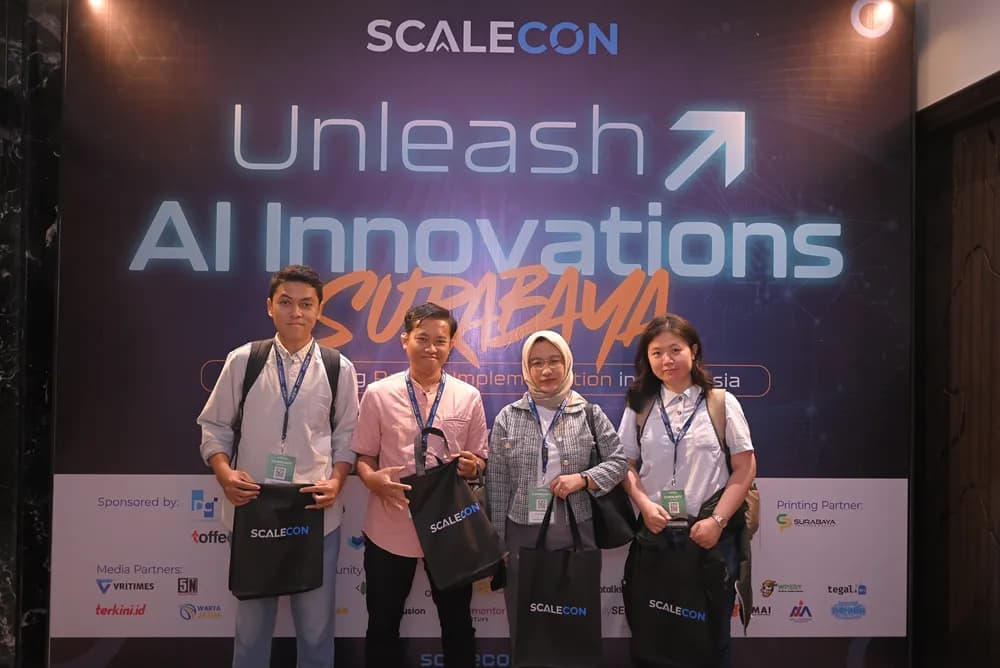 Attendees with their goodie bags at the SCALECON Surabaya 2026 photo wall