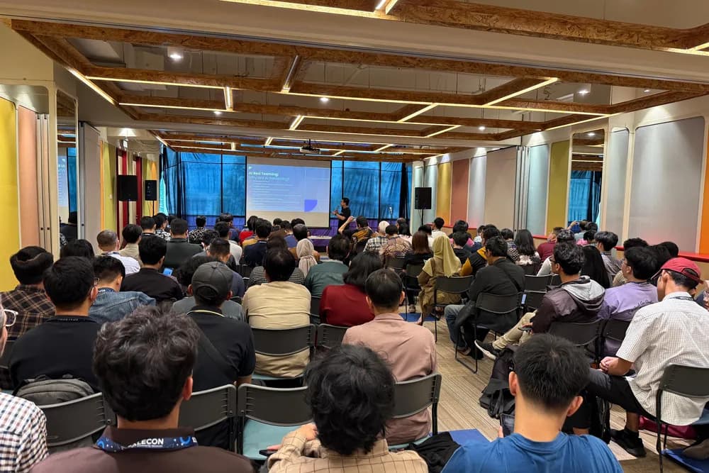 A full workshop room following the AI red teaming session at a previous SCALECON