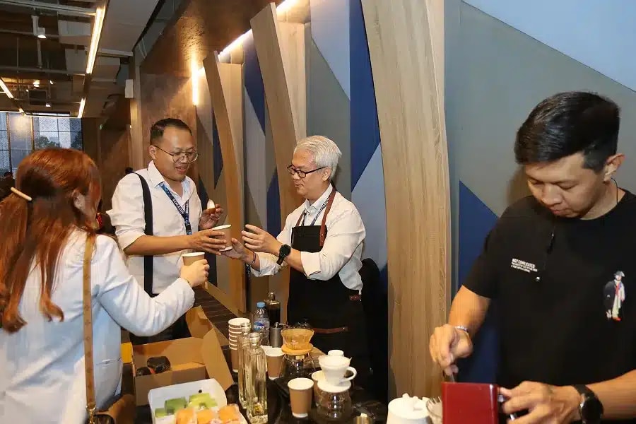 Attendees being served at the coffee counter at a previous SCALECON